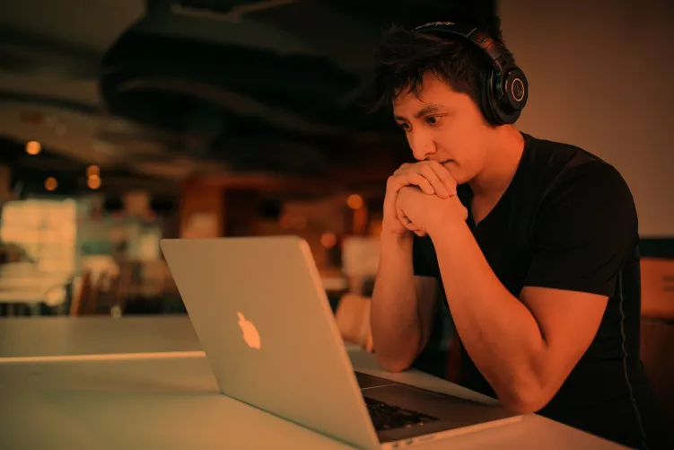 Man looking at laptop