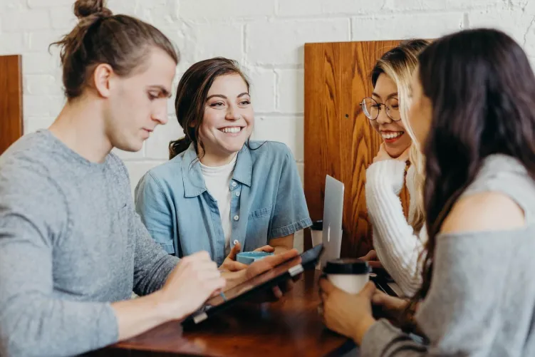 People around a tablet