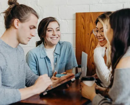 People around a tablet